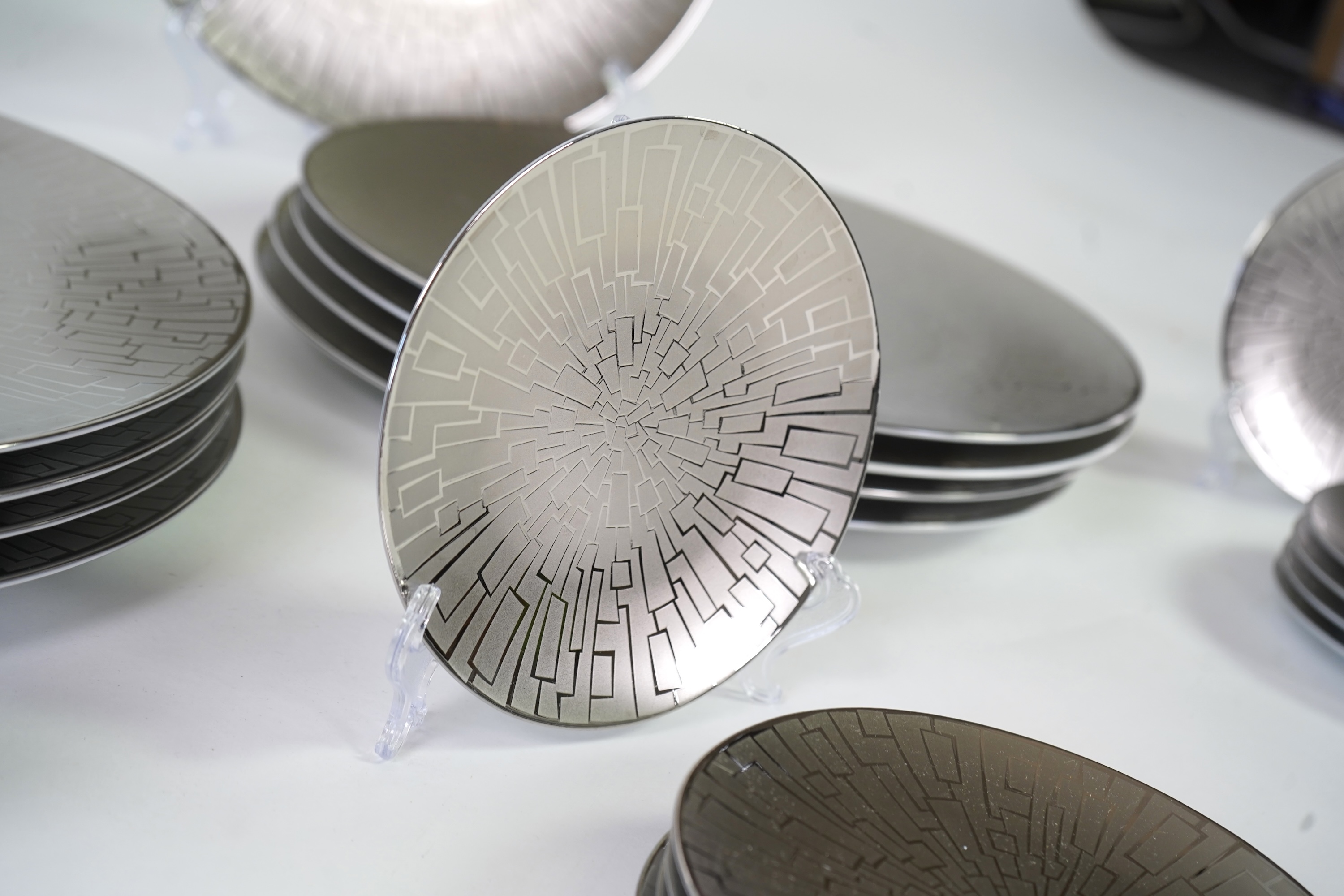 A collection of Rosenthal studio line TAC Gropius Skin platinum dinnerware, largest 33cm in diameter